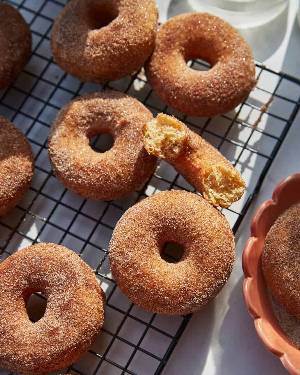 spiced easter doughnuts on a wire rack