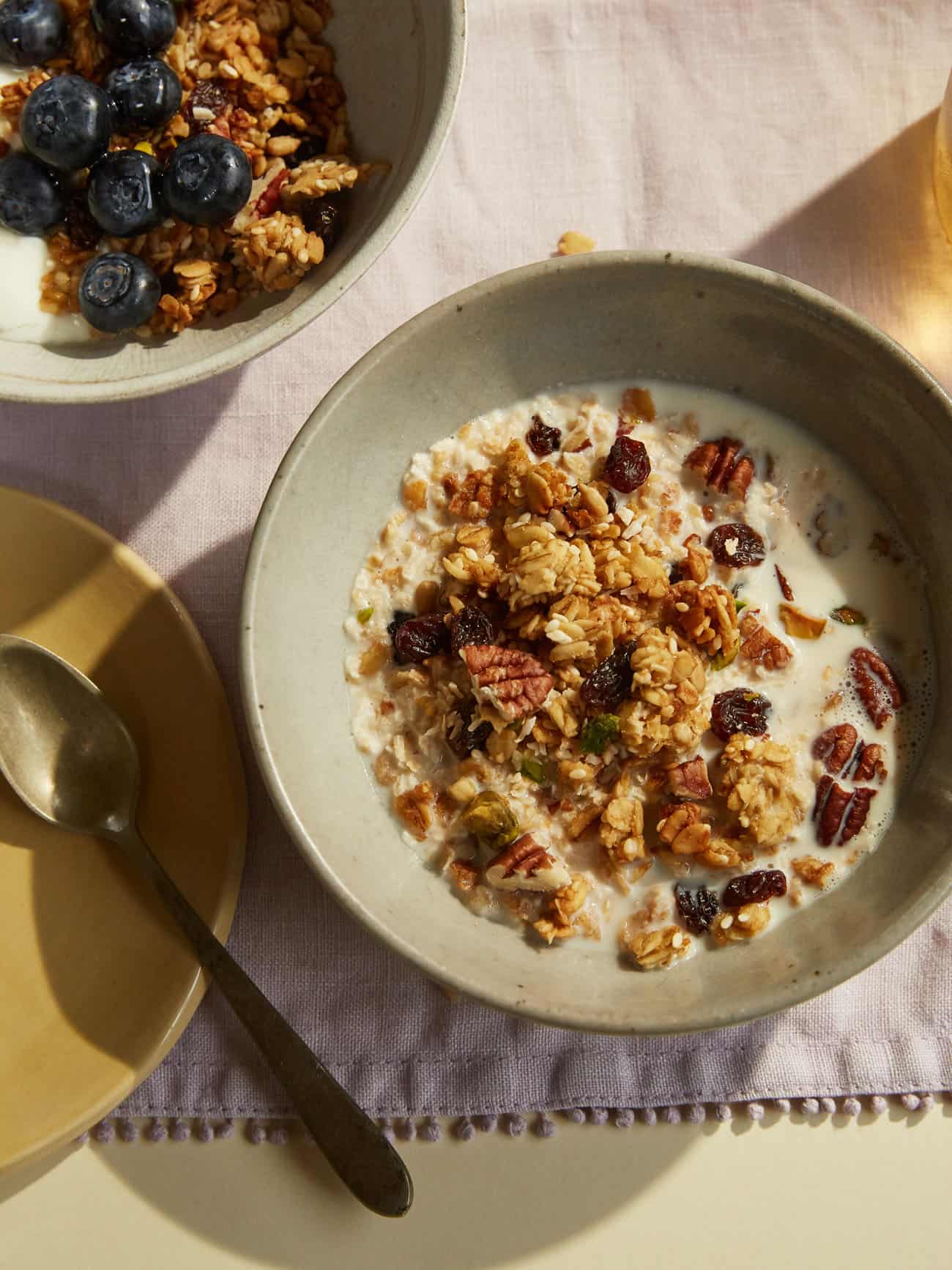 a bowl of granola with milk