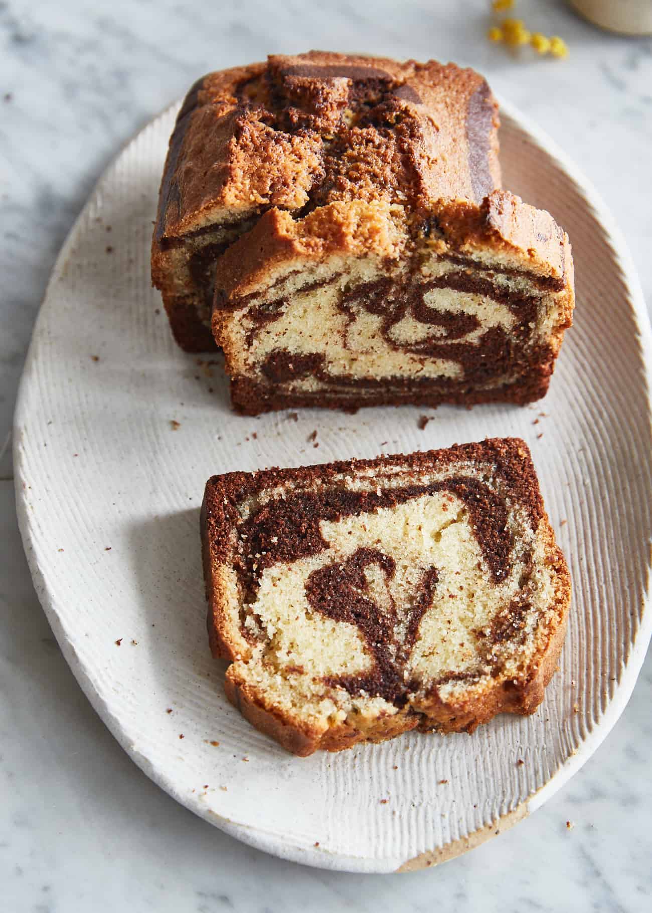 vegan marble cake sliced on a plate