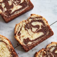 Slices of marble cake on a marble background