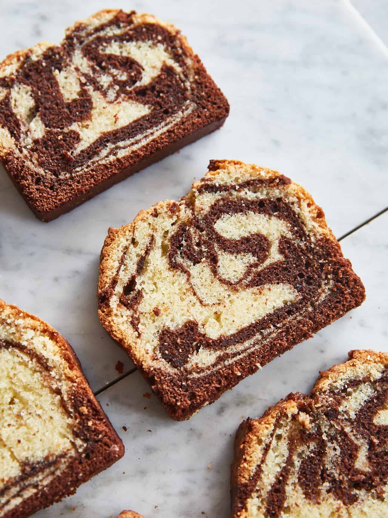 Slices of marble cake on a marble background