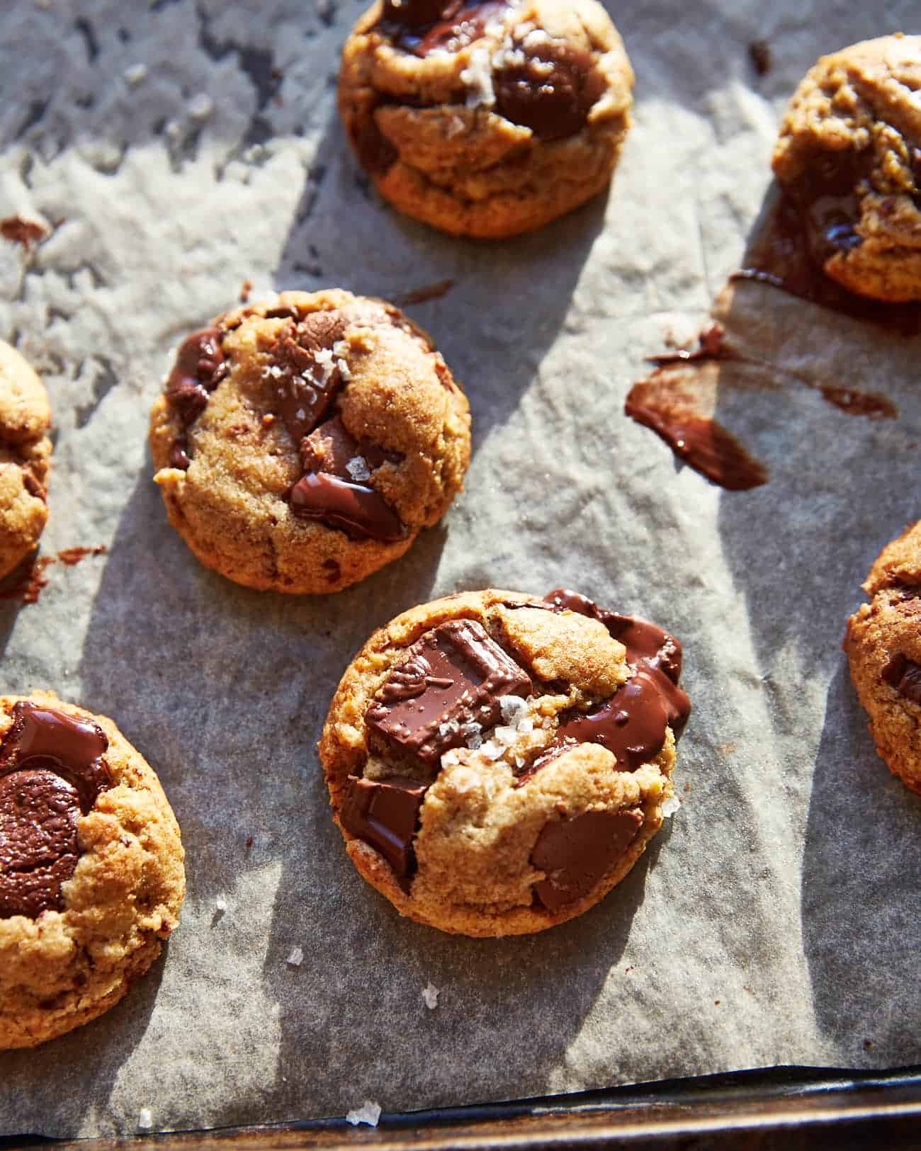 a tray of some vegan cookies with chocolate chips and salt