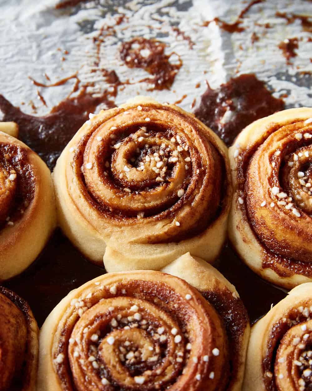 closeup of mashed potato cinnamon rolls on a tray